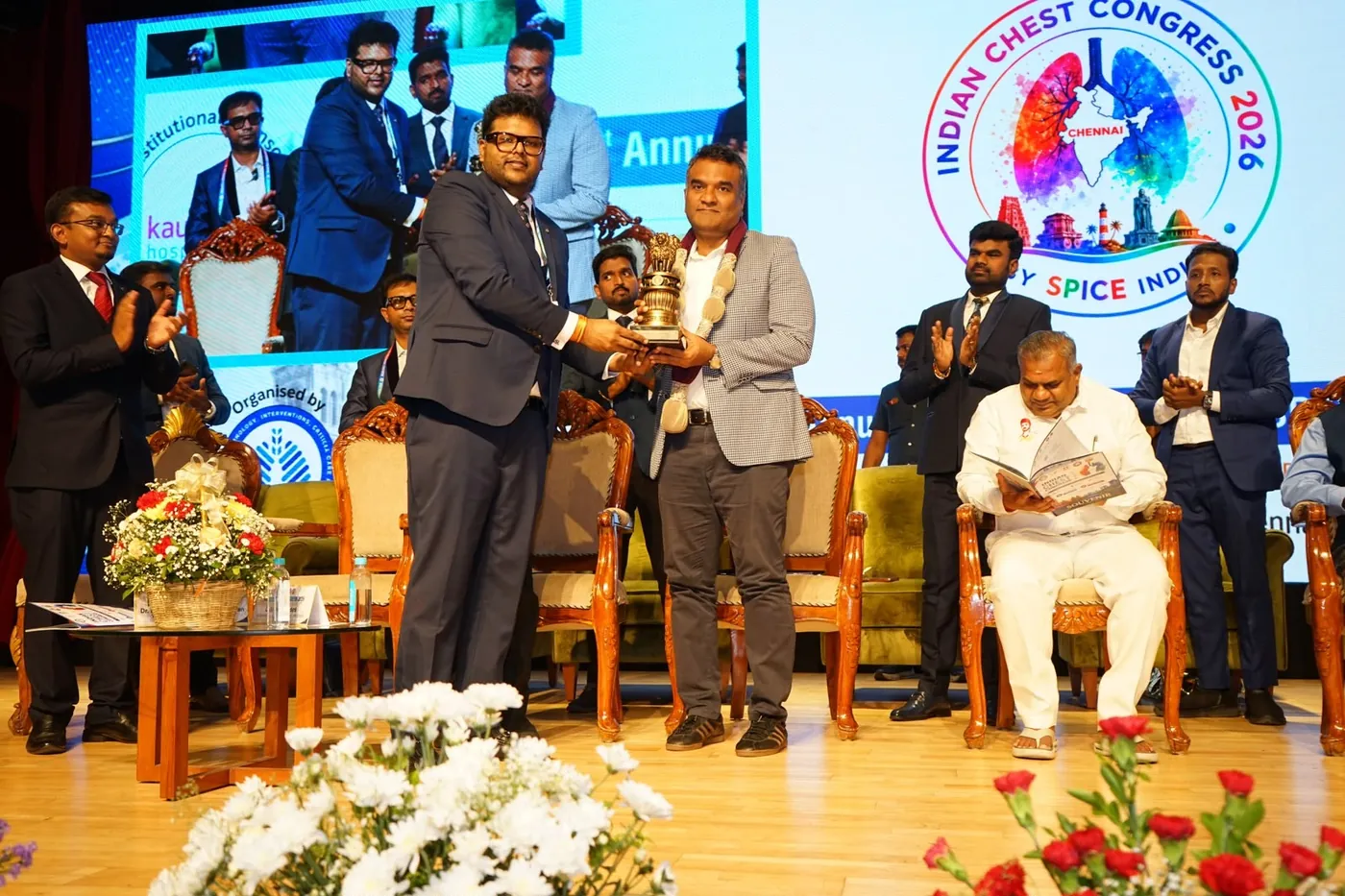 Felicitation on stage at Indian Chest Congress 2026.